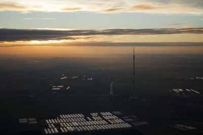 High angle view of city against sky during sunset