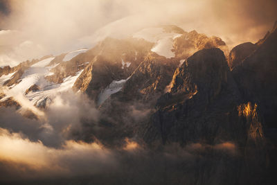 Scenic view of mountains against sky during winter