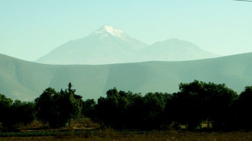 Scenic view of mountains against clear sky