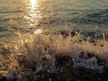 High angle view of waves on beach