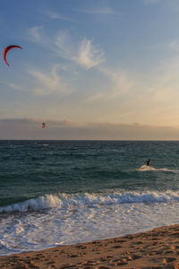 Scenic view of sea against sky during sunset