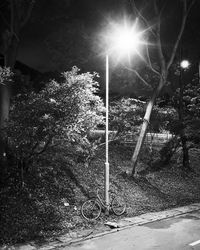 Illuminated street light on sunny day