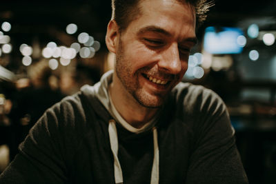 Close-up portrait of a smiling young man