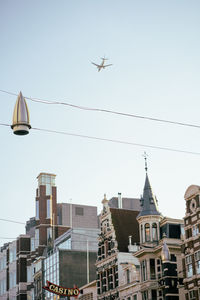 Low angle view of buildings against clear sky