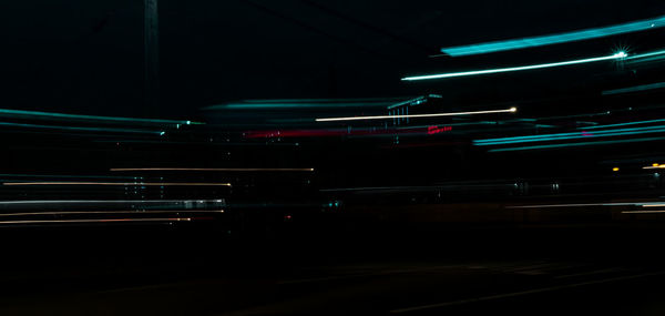 Light trails on illuminated city at night