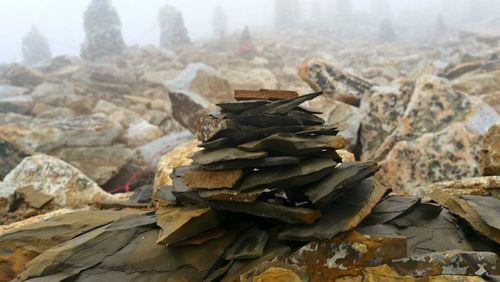 Stack of rocks on field