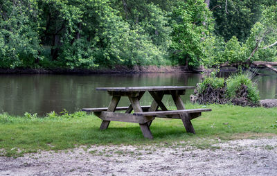 A picnic table sits ready for campers along the tippecanoe river in a state park in indiana usa