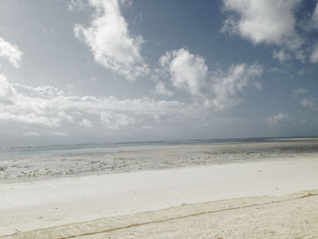 Scenic view of beach against sky