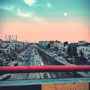 High angle view of railroad tracks amidst buildings in city
