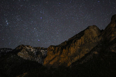 Low angle view of mountain at night
