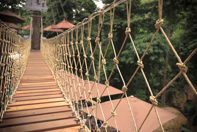 Metal fence by footbridge