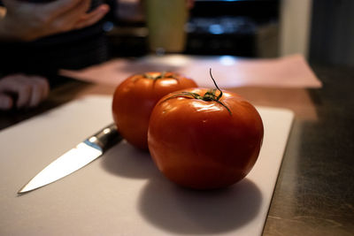 Close-up of oranges on table