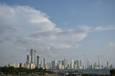 Modern cityscape against sky