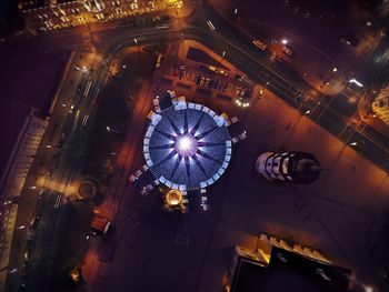 Directly above view of illuminated lights in city at night