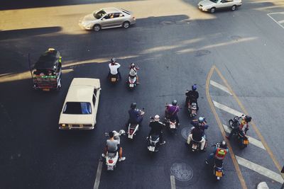 High angle view of vehicles on road in city