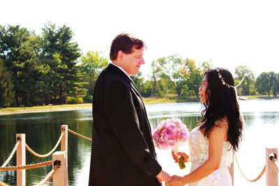 Side view of couple during wedding ceremony