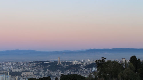 High angle view of townscape against sky during sunset