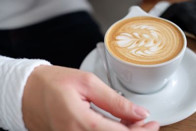 Close-up of coffee cup on table