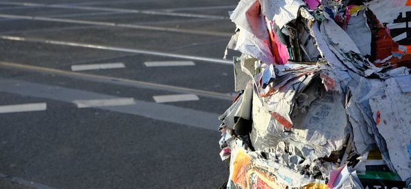 Close-up of garbage in city