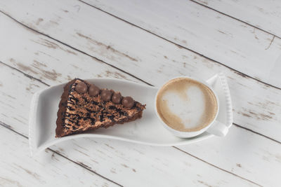 High angle view of coffee cup on table