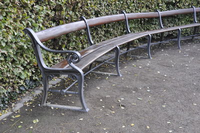 High angle view of empty bench in park