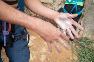 Midsection of man with messy hands