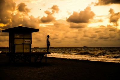 Scenic view of sea at sunset