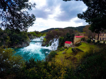 Scenic view of river against sky