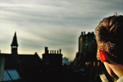 Low angle view of hand against sky