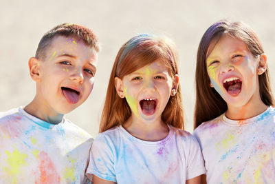 Portrait of smiling kids with mouth open