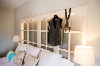 People relaxing on bed at home