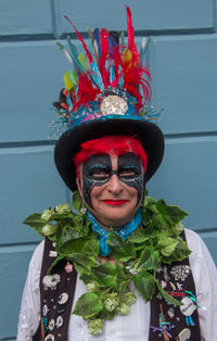 Portrait of smiling woman in traditional clothing