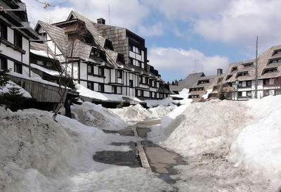 Hotels in ski center covered by snow