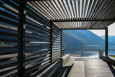 View of sea against sky seen through window