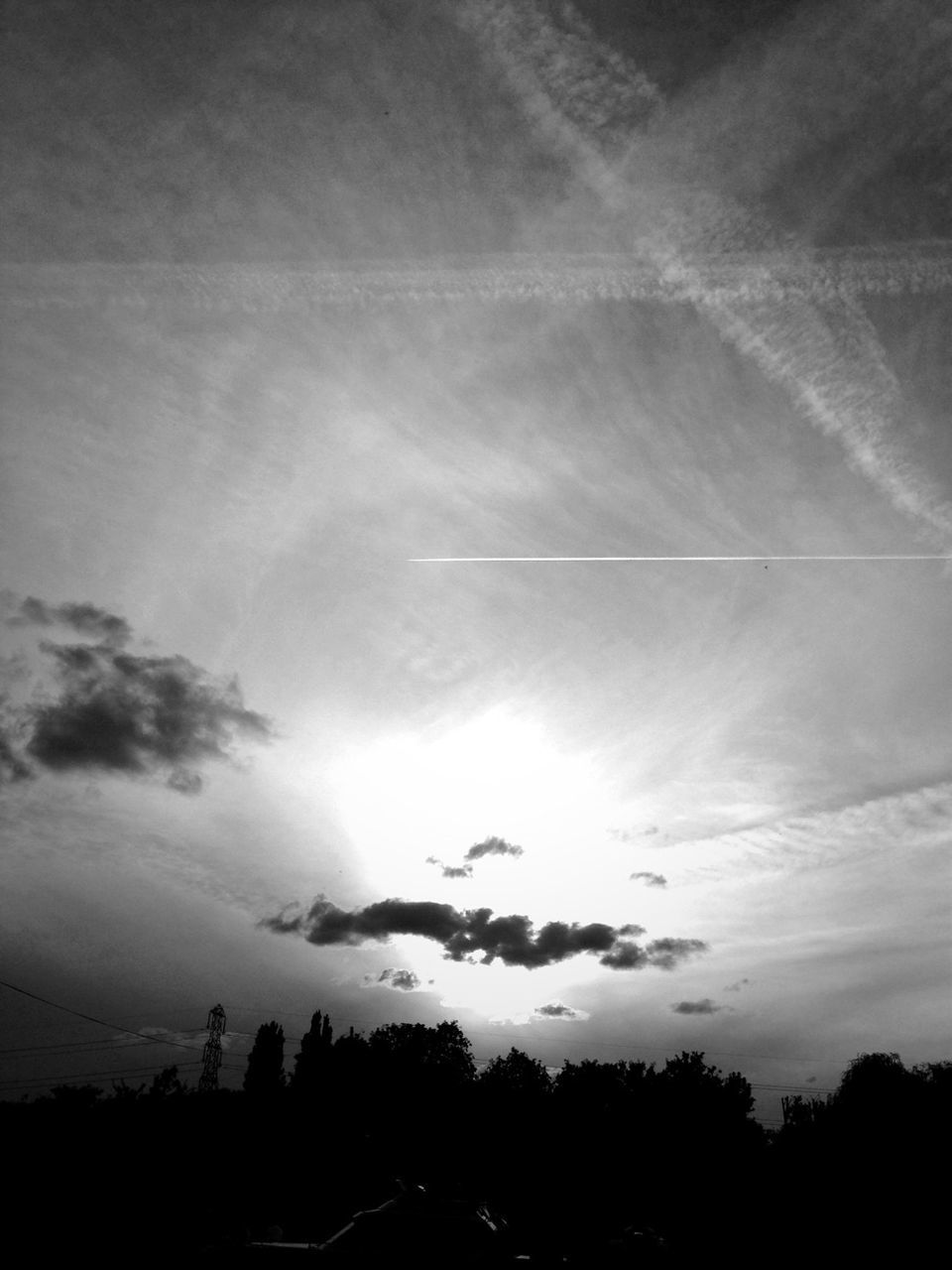 silhouette, sky, tranquility, tranquil scene, beauty in nature, scenics, tree, nature, cloud - sky, sunset, landscape, low angle view, idyllic, cloud, outdoors, cloudy, sunlight, no people, sunbeam, dusk