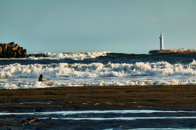 Scenic view of sea against clear sky