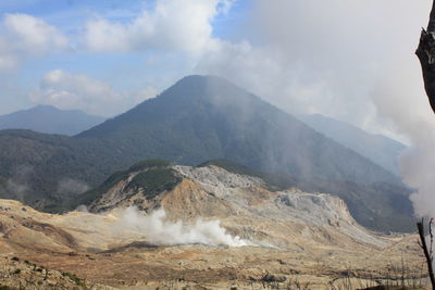 Scenic view of mountain range against sky