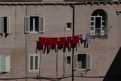 Clothes drying against building