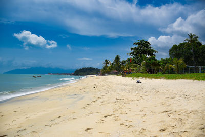 Scenic view of beach against sky