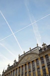 Low angle view of built structure against blue sky