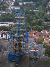 High angle view of empty playground by buildings in city