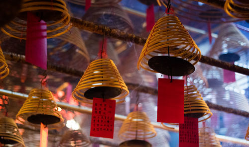 Low angle view of lanterns hanging in temple