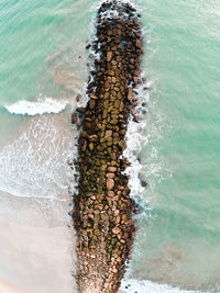 High angle view of rocks on beach