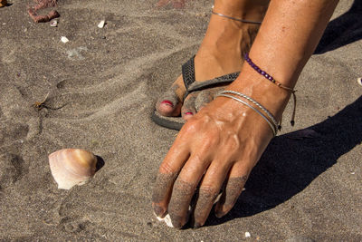 Low section of woman on beach