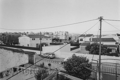 Buildings against clear sky