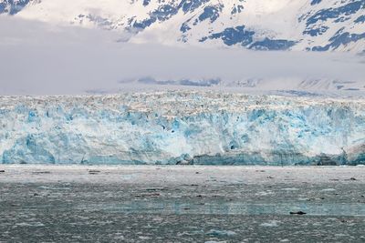 Scenic view of sea against sky during winter