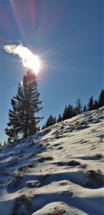 Scenic view of snow covered mountain against sky