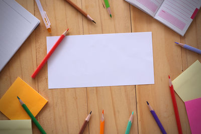 High angle view of colored pencils on table