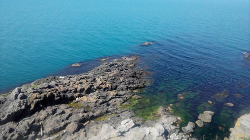 Scenic view of sea against blue sky