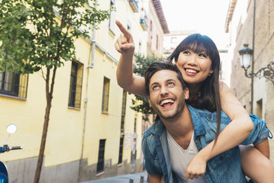 Portrait of smiling young couple